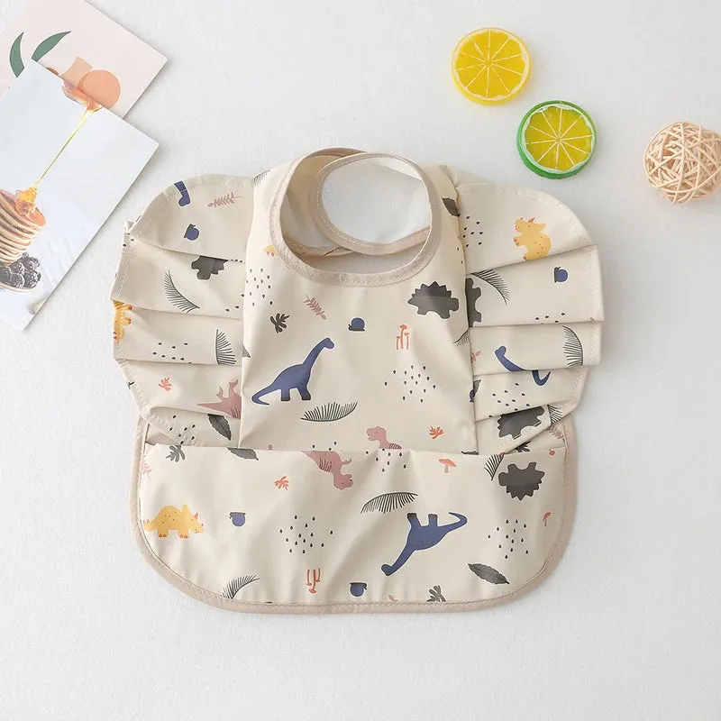 Baby Wings Bib - Beige Dinosaurs